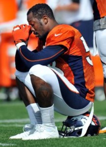 Denver Broncos linebacker Von Miller reacts as he sits on his helmet during football training camp, Saturday, July 27, 2013, in Englewood, Colo. (AP Photo/Jack Dempsey)